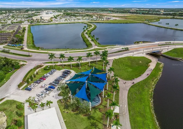 Listing Photo 2 - Condo for sale in building located at 6430 Moorings Pt Cir, Sarasota, FL 34202 - Unit #201