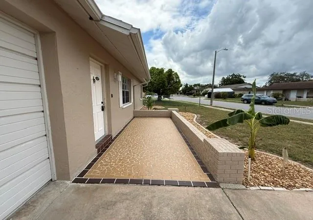 Photo 2 of Single family home for sale at 8615 Briar Patch Dr, Port Richey, FL 34668 | MLS# TB8540926 | Listing updated on 2026-09-02
