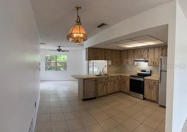 Photo 4 of Single family home for sale at 8615 Briar Patch Dr, Port Richey, FL 34668 | MLS# TB8540926 | Listing updated on 2026-09-02