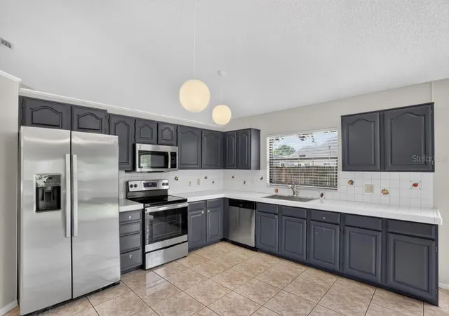 Photo 3 of Sale Pending at 2024 Norfield Ct, Orlando, FL 32837 | MLS# O6435340 | Listing updated on 2026-10-25