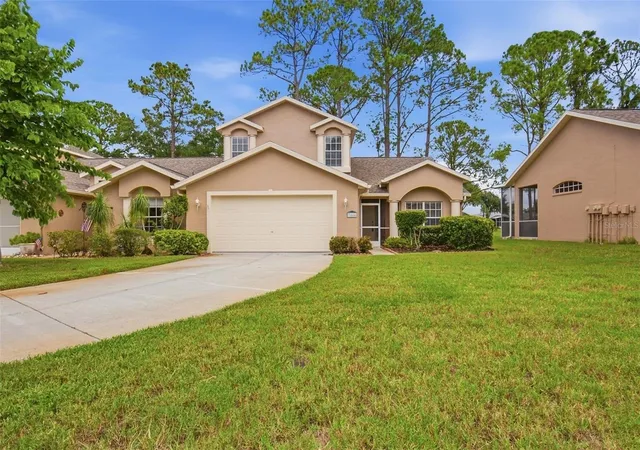 Photo 1 of Single family home for sale at 7444 Moorgate Ct, New Port Richey, FL 34654 | MLS# O6435383 | Listing updated on 2026-08-22