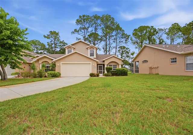 Photo 2 of Single family home for sale at 7444 Moorgate Ct, New Port Richey, FL 34654 | MLS# O6435383 | Listing updated on 2026-08-22