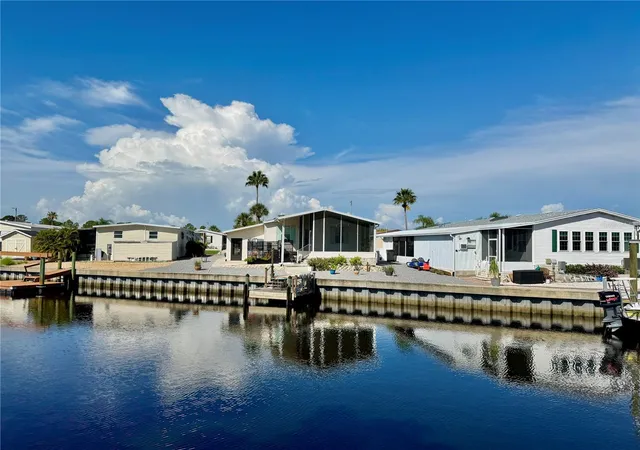 Photo 3 of Manufactured home for sale at 115 E Saint Annes Cir, Apollo Beach, FL 33572 | MLS# TB8541005 | Listing updated on 2026-09-21