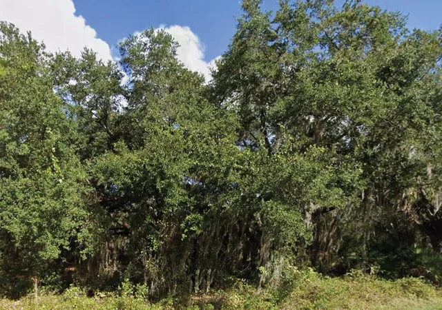 1st image of 0 Mineola Dr, Indian Lake Estates, FL 33855 | MLS# O6435415