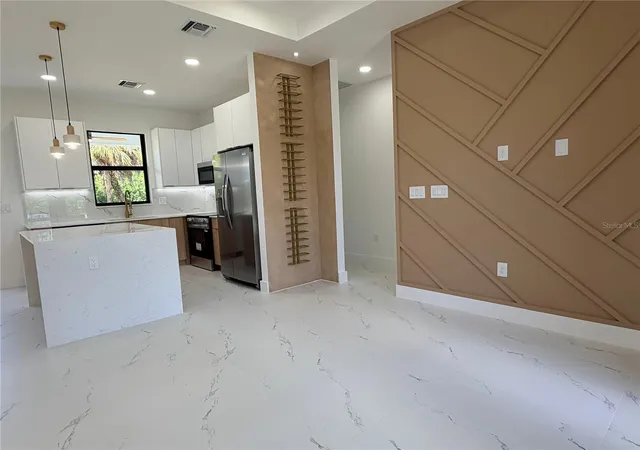 5th image of 3812 11Th St Sw, Lehigh Acres, FL 33976 | MLS# TB8541020