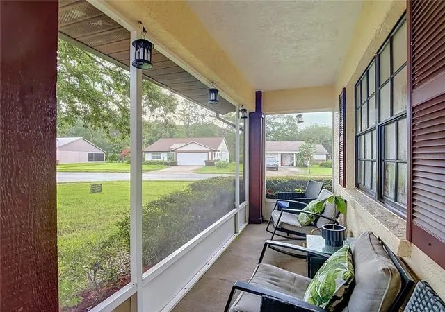 Photo 3 of Single family home for sale at 7407 Baltusrol Dr, New Port Richey, FL 34654 | MLS# TB8541052 | Listing updated on 2026-09-01