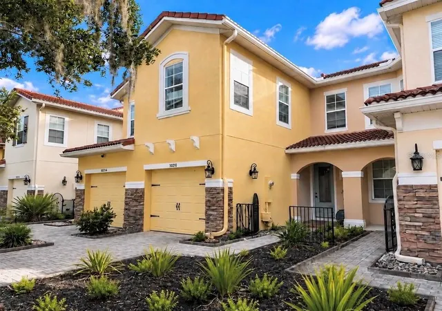 Photo 1 of Townhouse for sale at 10210 Fallsgrove St, Orlando, FL 32836 | MLS# O6435462 | Listing updated on 2026-10-24