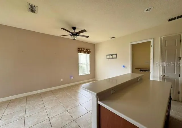 4th image of 896 Barcelona Dr, Poinciana, FL 34759 | MLS# O6435573