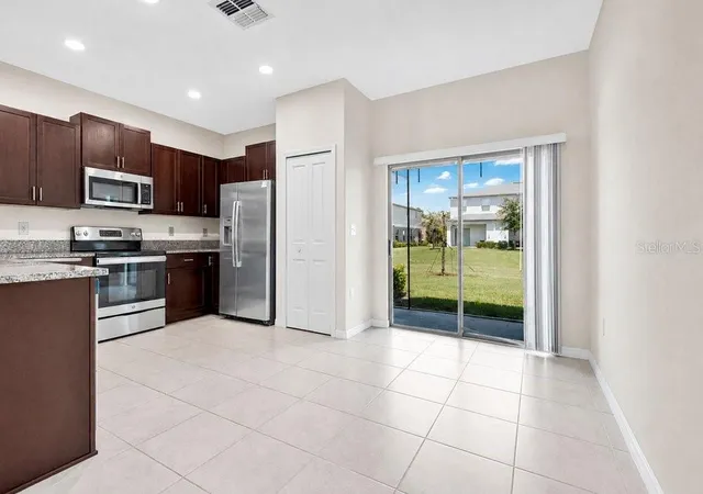 Photo 3 of Townhouse for sale at 9640 Mulberry Marsh Ln, Sun City Center, FL 33573 | MLS# O6435591 | Listing updated on 2026-08-28