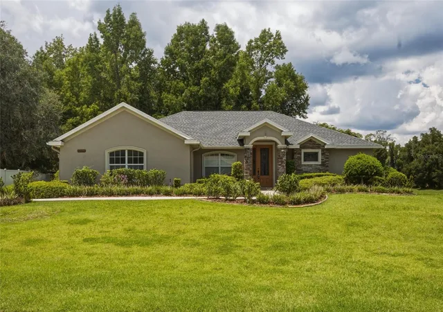 Photo 1 of Single family home for sale at 10040 Se 42nd Ct, Belleview, FL 34420 | MLS# OM730855 | Listing updated on 2026-09-21