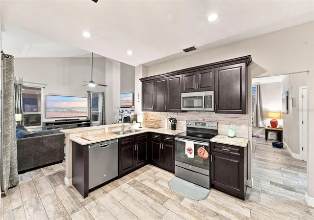 Photo 3 of Single family home for sale at 3874 Gatlin Pl Cir, Orlando, FL 32812 | MLS# O6435652 | Listing updated on 2026-10-22