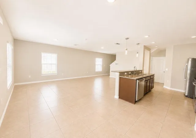 Photo 3 of Single family home for sale at 7422 Evening Primrose Ct, Tampa, FL 33619 | MLS# TB8541323 | Listing updated on 2026-10-02