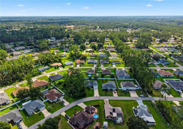 Photo 57 of Single family home for sale at 15 Ridley Ln, Palm Coast, FL 32164 | MLS# FC320890 | Listing updated on 2026-08-26