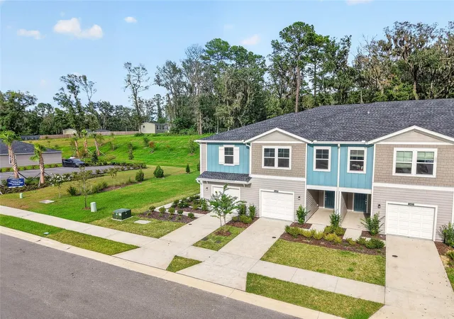 Photo 2 of Townhouse for sale at 16443 NW 144th Street, Alachua, FL 32615 | MLS# OM730874 | Listing updated on 2026-09-14