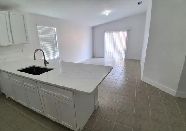 5th image of 1047 Florida Holly Dr, Orlando, FL 32811 | MLS# O6435731