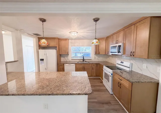 Photo 2 of Single family home for sale at 5122 Bay Blvd, Port Richey, FL 34668 | MLS# O6435777 | Listing updated on 2026-10-23