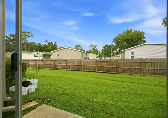 3rd image of 9848 Ashburn Lake Dr, Tampa, FL 33610 | MLS# L4964493