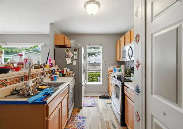 5th image of 9848 Ashburn Lake Dr, Tampa, FL 33610 | MLS# L4964493