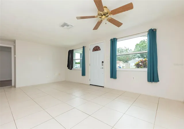 5th image of 1447 Weyford Ln, Holiday, FL 34691 | MLS# TB8541448