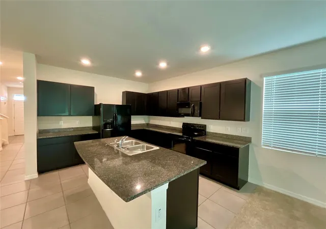Photo 4 of Townhouse for sale at 1720 Hubbell Rd, Wesley Chapel, FL 33543 | MLS# TB8541468 | Listing updated on 2026-10-08
