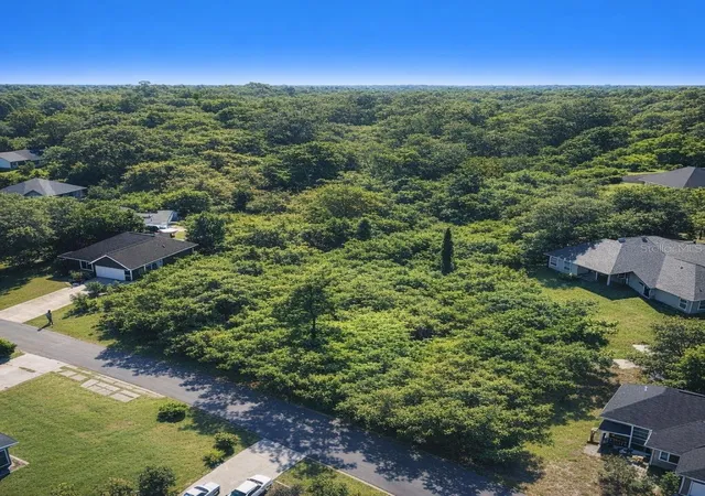 Photo 2 of Land for sale at 1115 & 1119 S Cooper Dr, Deltona, FL 32725 | MLS# TB8541484 | Listing updated on 2026-09-18
