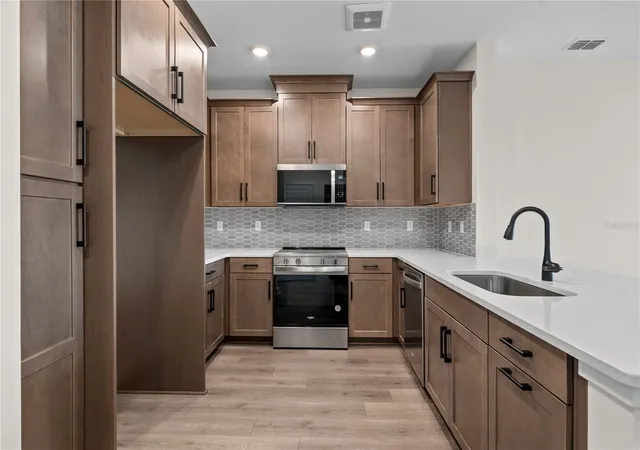 Photo 3 of Condo for sale at 7545 Laureate Blvd #7404, Orlando, FL 32827 | MLS# O6435862 | Listing updated on 2026-09-29