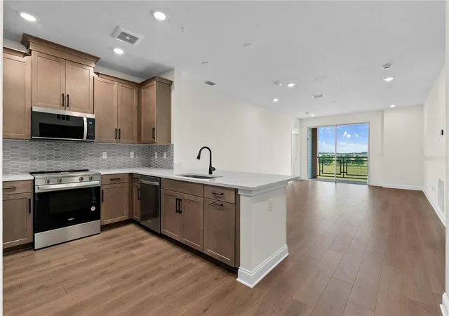 Photo 4 of Condo for sale at 7545 Laureate Blvd #7404, Orlando, FL 32827 | MLS# O6435862 | Listing updated on 2026-09-29