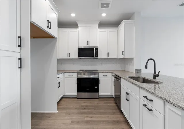 Photo 4 of Condo for sale at 7545 Laureate Blvd #7408, Orlando, FL 32827 | MLS# O6435869 | Listing updated on 2026-09-28