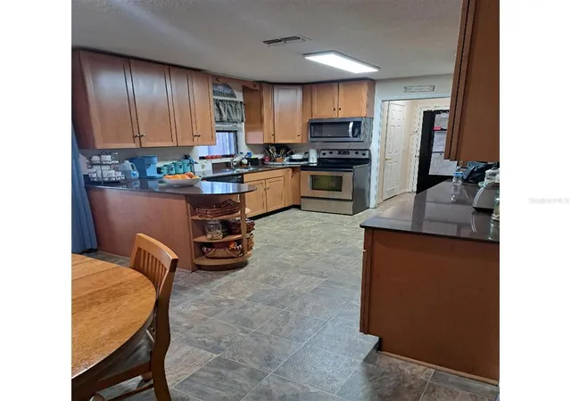 4th image of 11301 Huggins St, Leesburg, FL 34788 | MLS# W7888844
