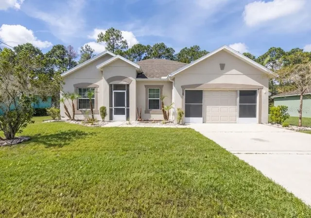 Photo 1 of Single family home for sale at 18 Kathleen Trl, Palm Coast, FL 32164 | MLS# FC320910 | Listing updated on 2026-09-12