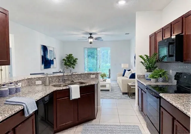 Photo 2 of Single family home for sale at 18 Kathleen Trl, Palm Coast, FL 32164 | MLS# FC320910 | Listing updated on 2026-09-12