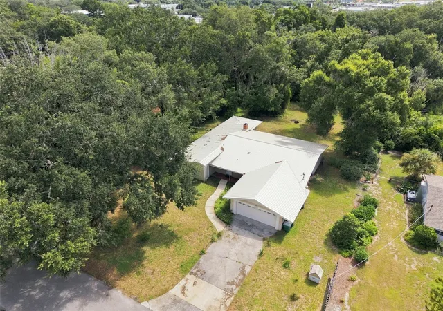 5th image of 11515 N Ravine Rd, Tampa, FL 33612 | MLS# TB8541750