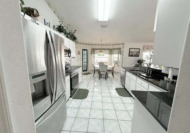Photo 4 of Single family home for sale at 22 Colorado Dr, Palm Coast, FL 32137 | MLS# FC320915 | Listing updated on 2026-10-14