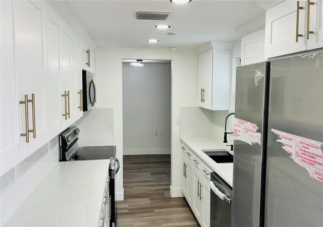 5th image of 1346 Chancellor Dr, Holiday, FL 34690 | MLS# O6436018