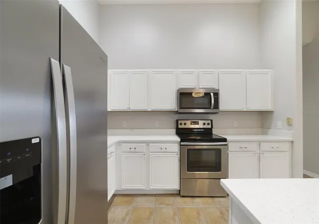Photo 4 of Townhouse for sale at 2141 Island Walk Dr, Orlando, FL 32824 | MLS# O6436026 | Listing updated on 2026-09-28