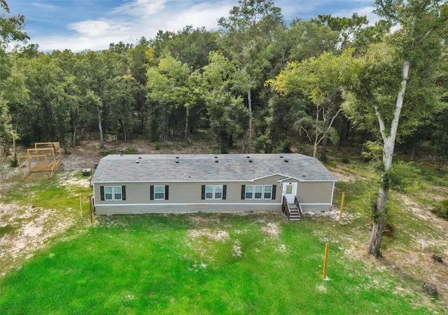1st image of 21619 41st Dr, Lake City, FL 32024 | MLS# TB8541782