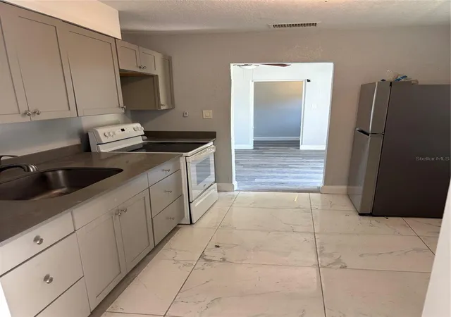 4th image of 4321 Lake Lawne Ave, Orlando, FL 32808 | MLS# O6436050
