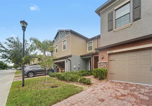 Photo 1 of Townhouse for sale at 17335 Old Tobacco Rd, Lutz, FL 33558 | MLS# O6436066 | Listing updated on 2026-09-02