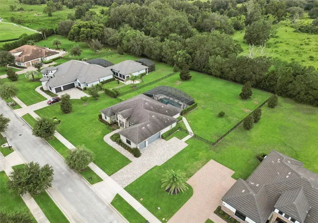 Photo 2 of Single family home for sale at 25874 Crossings Bluff, Sorrento, FL 32776 | MLS# O6436113 | Listing updated on 2026-08-27