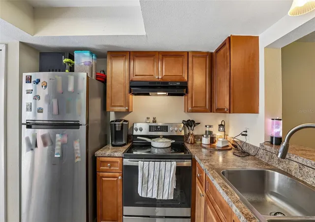 Photo 4 of Townhouse for sale at 12061 Tift Cir, Orlando, FL 32826 | MLS# O6436128 | Listing updated on 2026-10-04