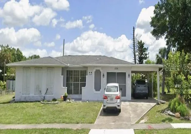 Photo 1 of Single family home for sale at 2306 Beacon Dr, Port Charlotte, FL 33952 | MLS# O6436134 | Listing updated on 2026-09-11