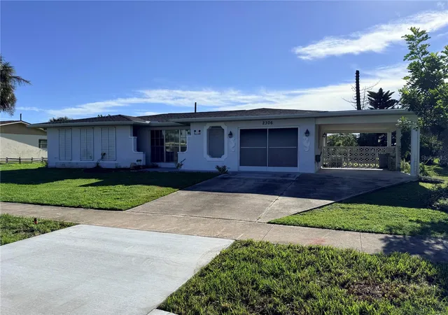 Photo 1 of Single family home for sale at 2306 Beacon Dr, Port Charlotte, FL 33952 | MLS# O6436134 | Listing updated on 2026-09-30