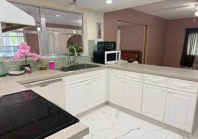 Photo 4 of Single family home for sale at 2306 Beacon Dr, Port Charlotte, FL 33952 | MLS# O6436134 | Listing updated on 2026-09-30