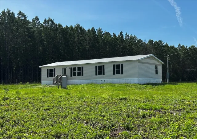 Photo 1 of Manufactured home for sale at 7351 Ne 106th Terrace, Bronson, FL 32621 | MLS# OM730963 | Listing updated on 2026-09-01