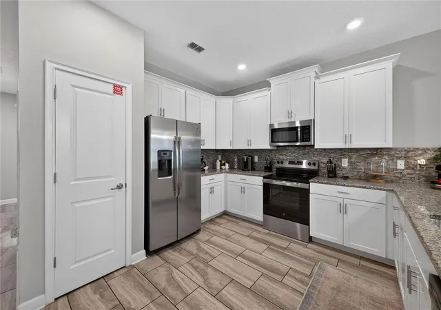 3rd image of 9016 Stinger Dr, Champions Gate, FL 33896 | MLS# S5156202