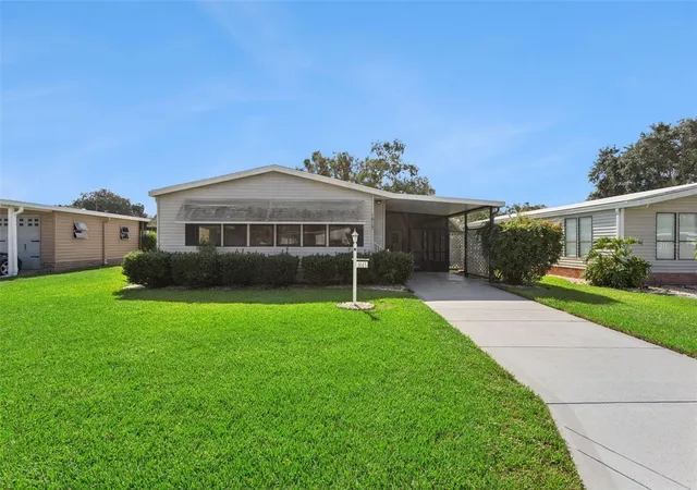 1st image of 1615 Pinehurst Dr, Lady Lake, FL 32159 | MLS# O6436168