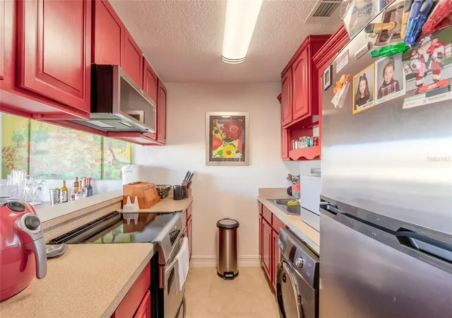 Listing Photo 4 - Condo for sale in building located at 428 Auburn Dr, DAYTONA BEACH, FL 32118 - Unit #202