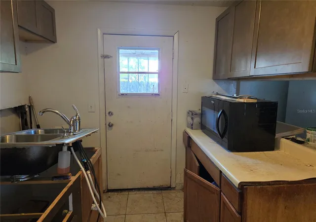 Photo 3 of Sale Pending at 913 E 22nd Avenue #A/B, Tampa, FL 33605 | MLS# TB8541993 | Listing updated on 2026-09-21