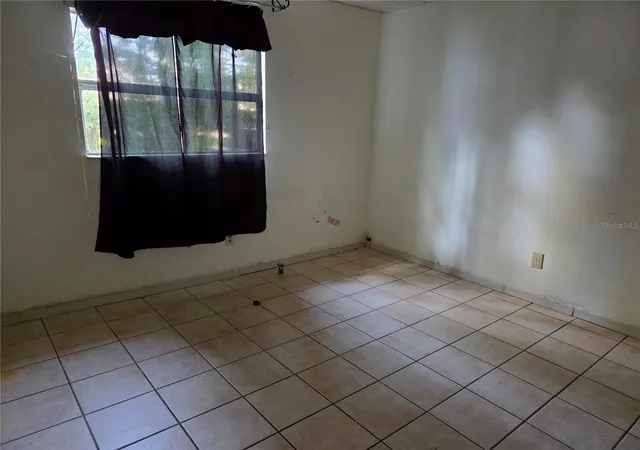 Listing Photo 5 - Condo for sale in building located at 913 E 22Nd Ave, Tampa, FL 33605 - Unit #A/B