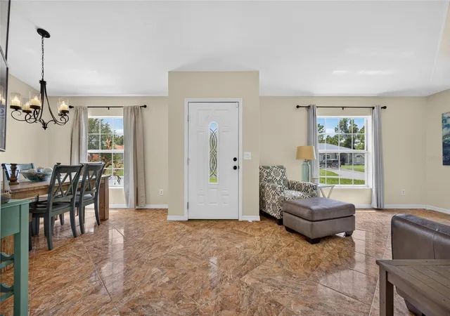 Photo 3 of Single family home for sale at 1406 Woodcrest Ln, North Port, FL 34286 | MLS# C7529930 | Listing updated on 2026-10-07